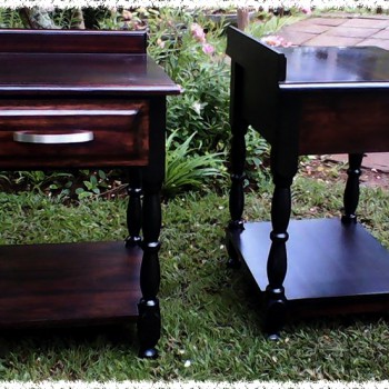 Dark stained solid wood bedside tables with turned legs