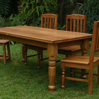 turned leg dining room table with matching solid timber chairs